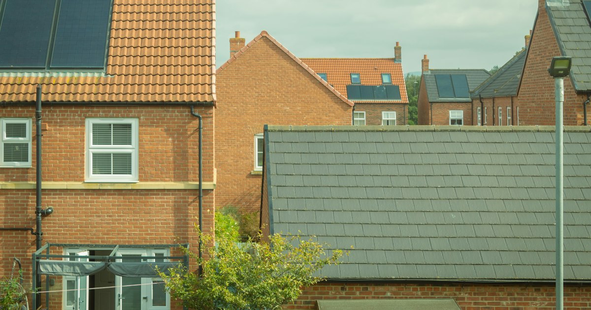 New-build brick houses with solar panels