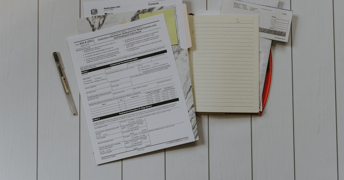 Claim forms and notes on a desk